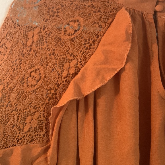 Size large top. New with tags. - Picture 2 of 3